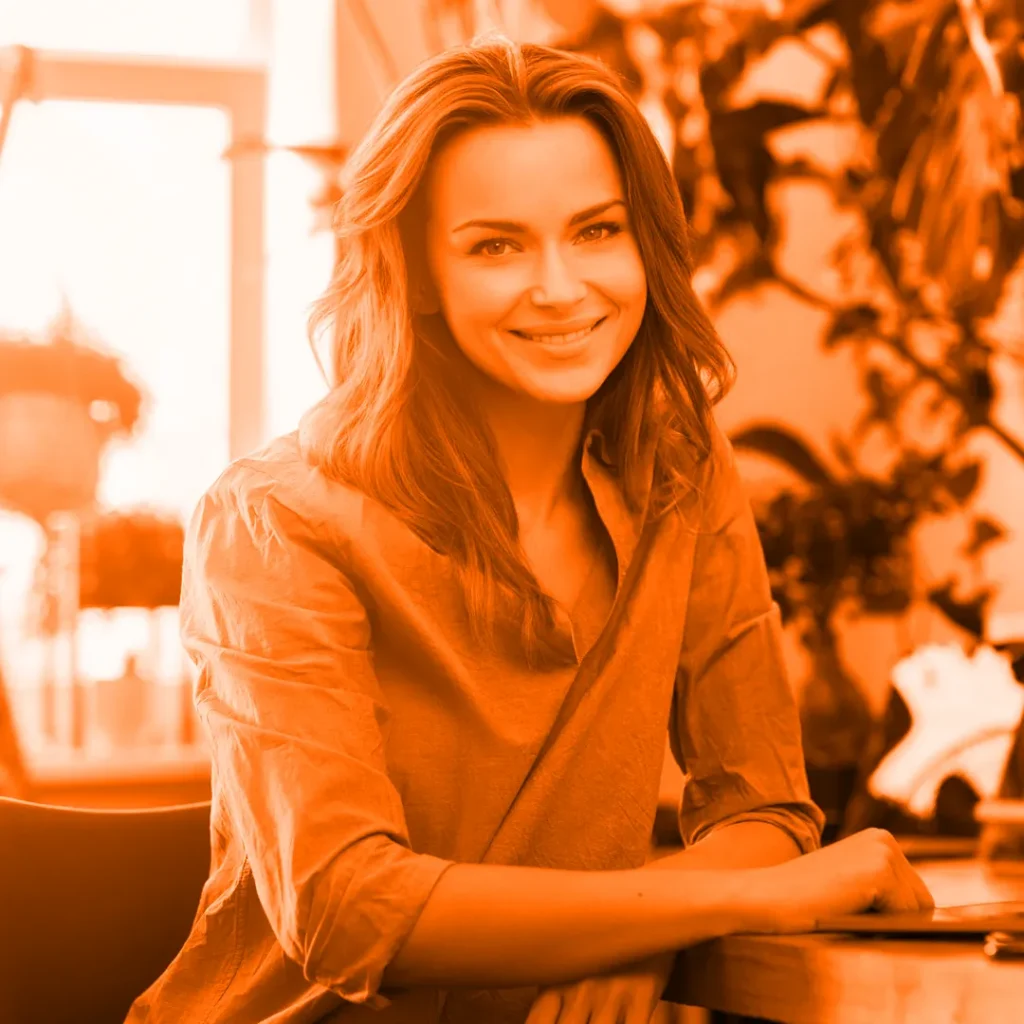 Happy website owner reading her website audit report