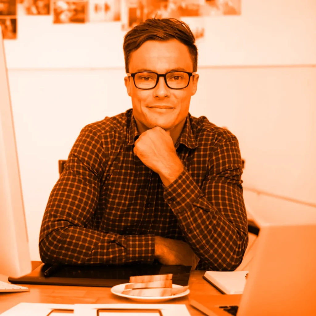 Website owner reviewing articles written by his content manager