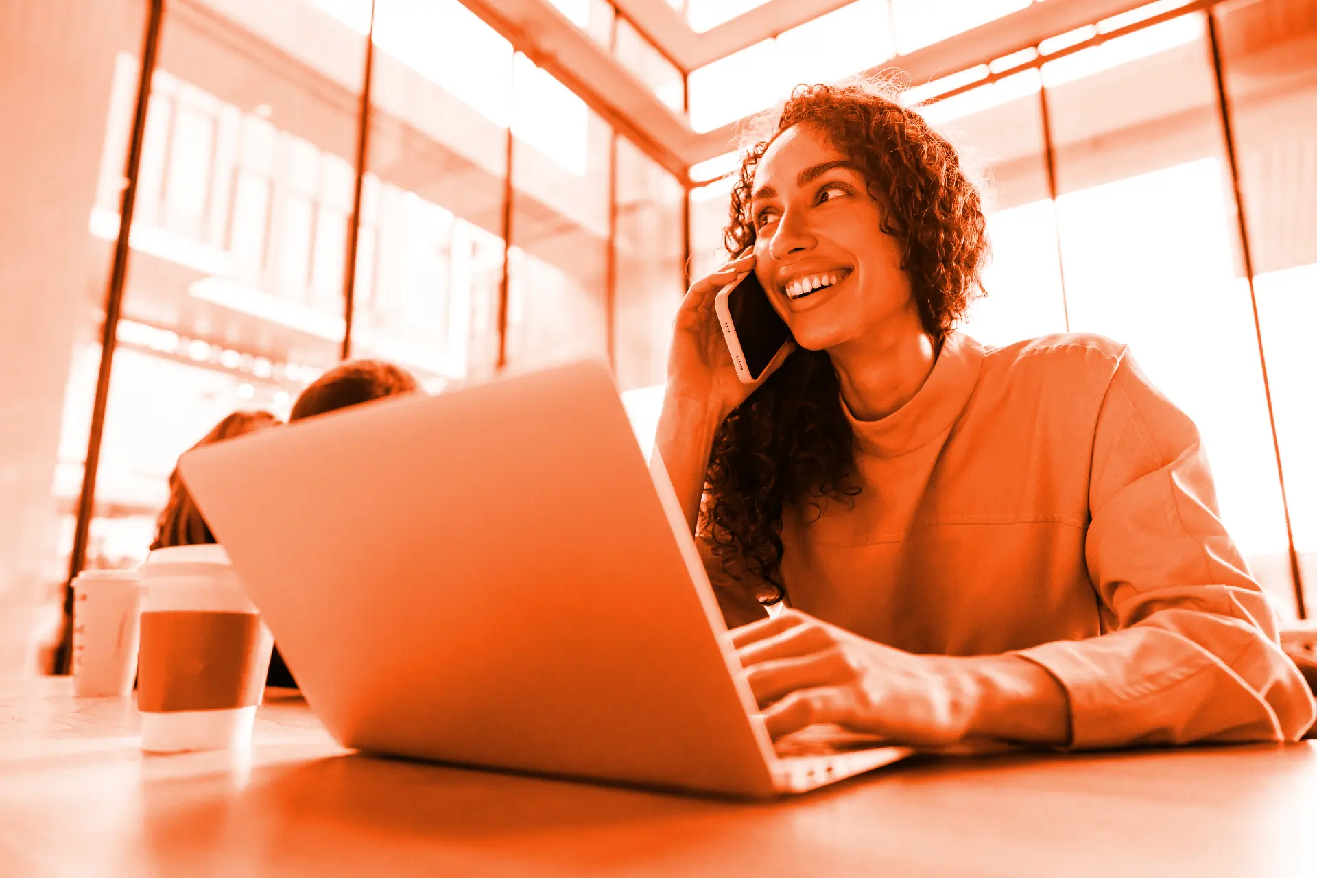 Business owner getting phone support for their website.