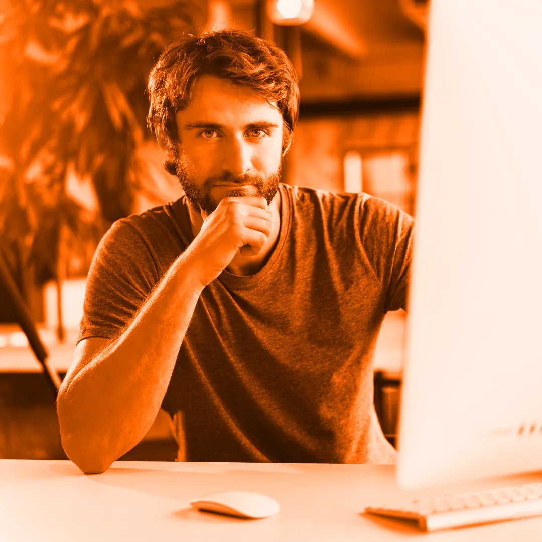 Man working on a solution to fix website